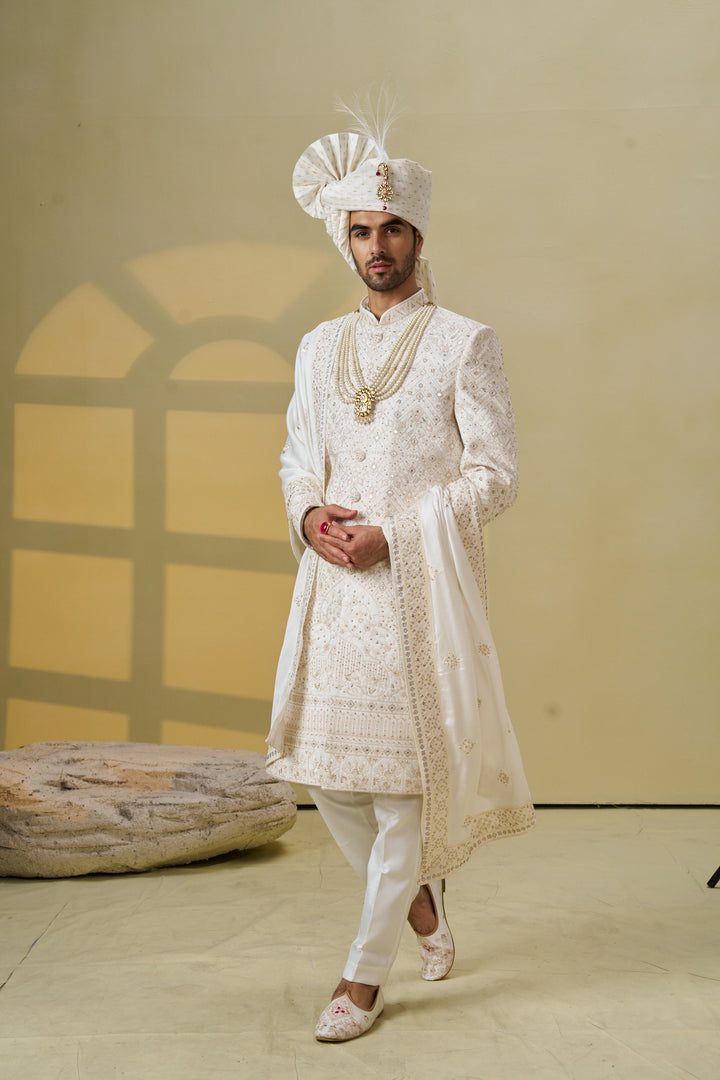 Ivory silk Sherwani set with embellishments (accessories included)