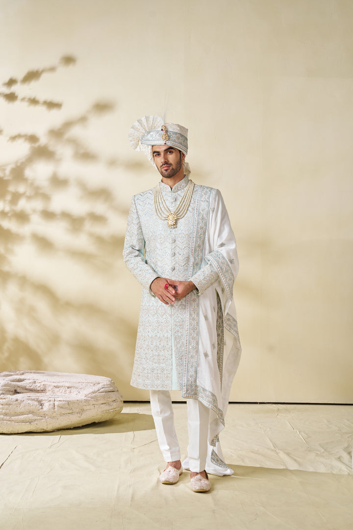Blue silk sherwani set with embellishments (accessories included)
