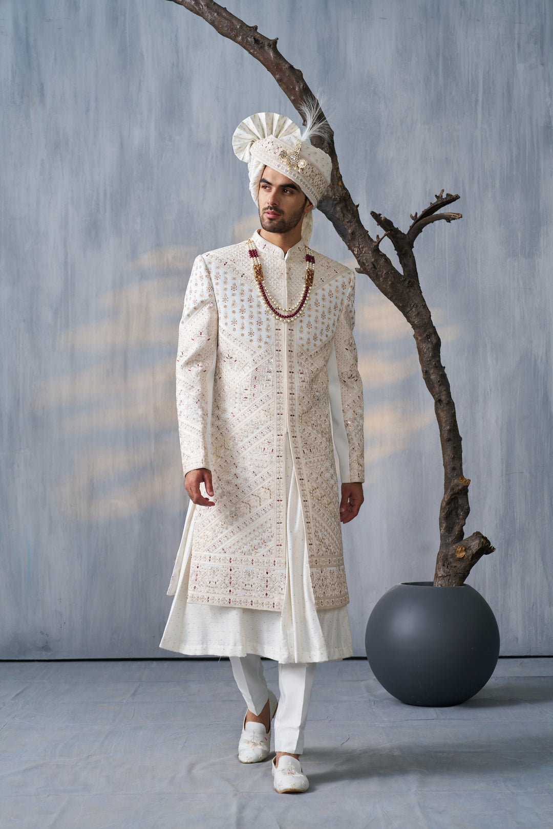 Ivory silk sherwani set with golden embroidery (accessories included)