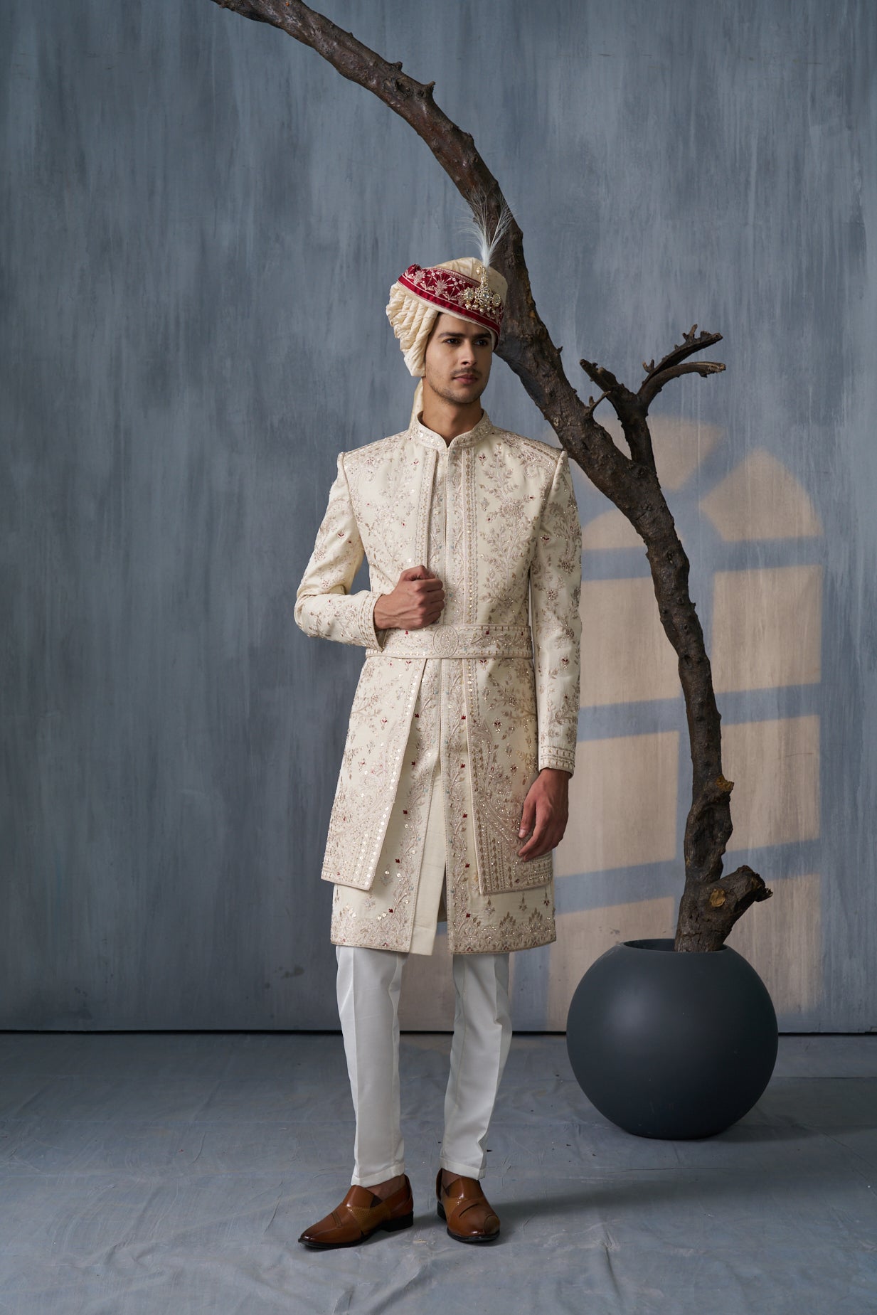 Cream silk sherwani  with embellishments