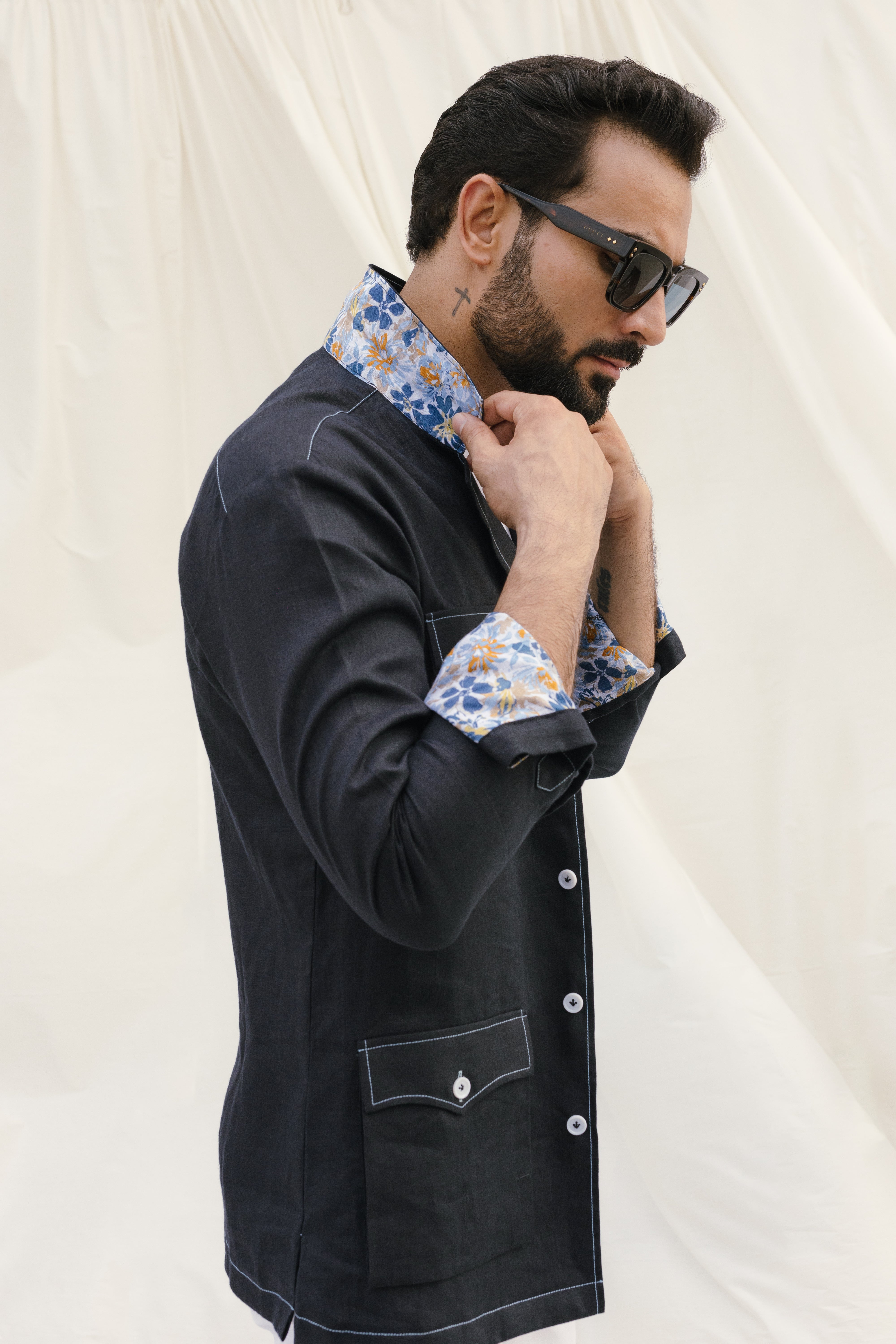 Black safari shirt with white contrast stitch and floral detail