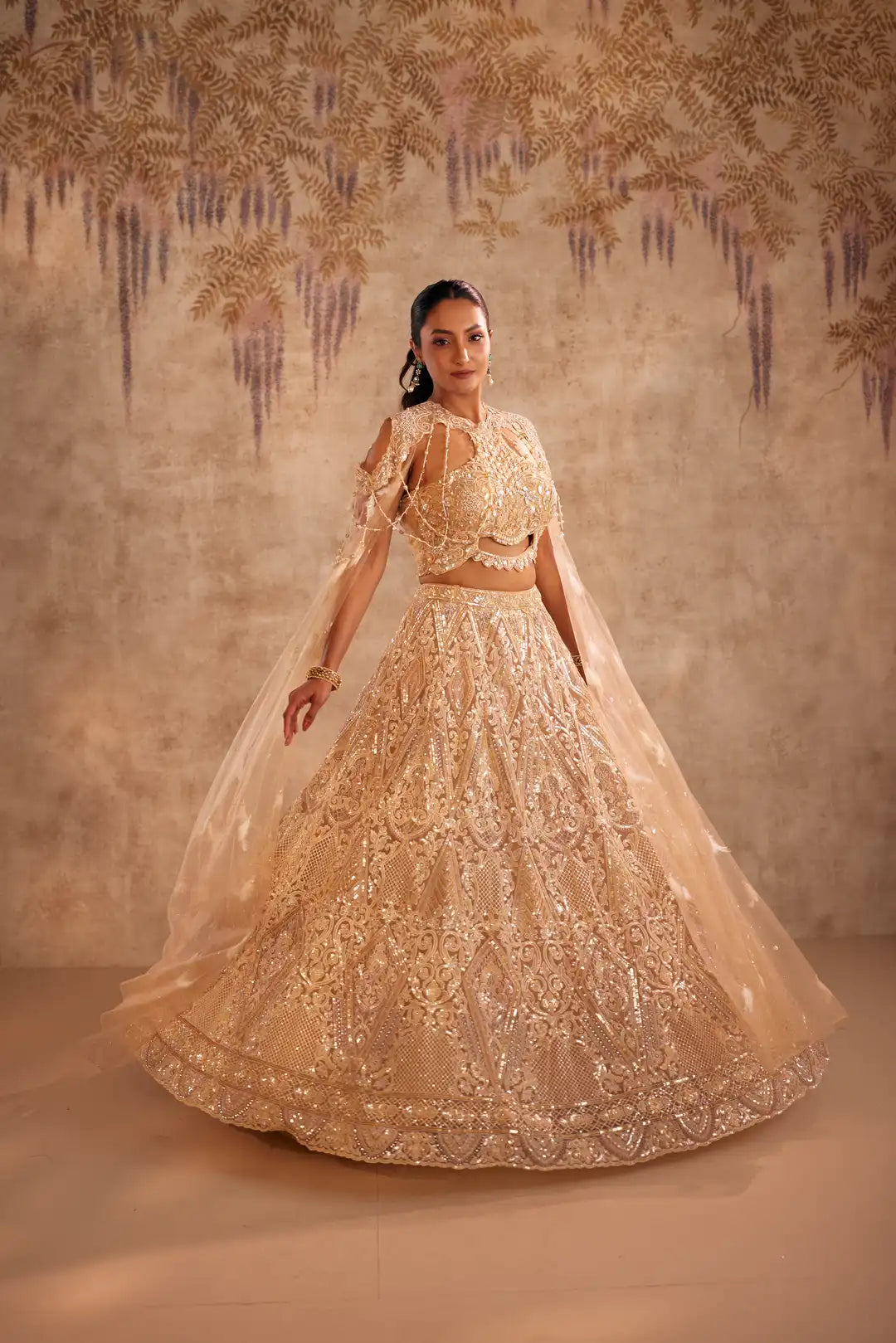 Cream Lehenga with Choker Style Cape and Embroidery