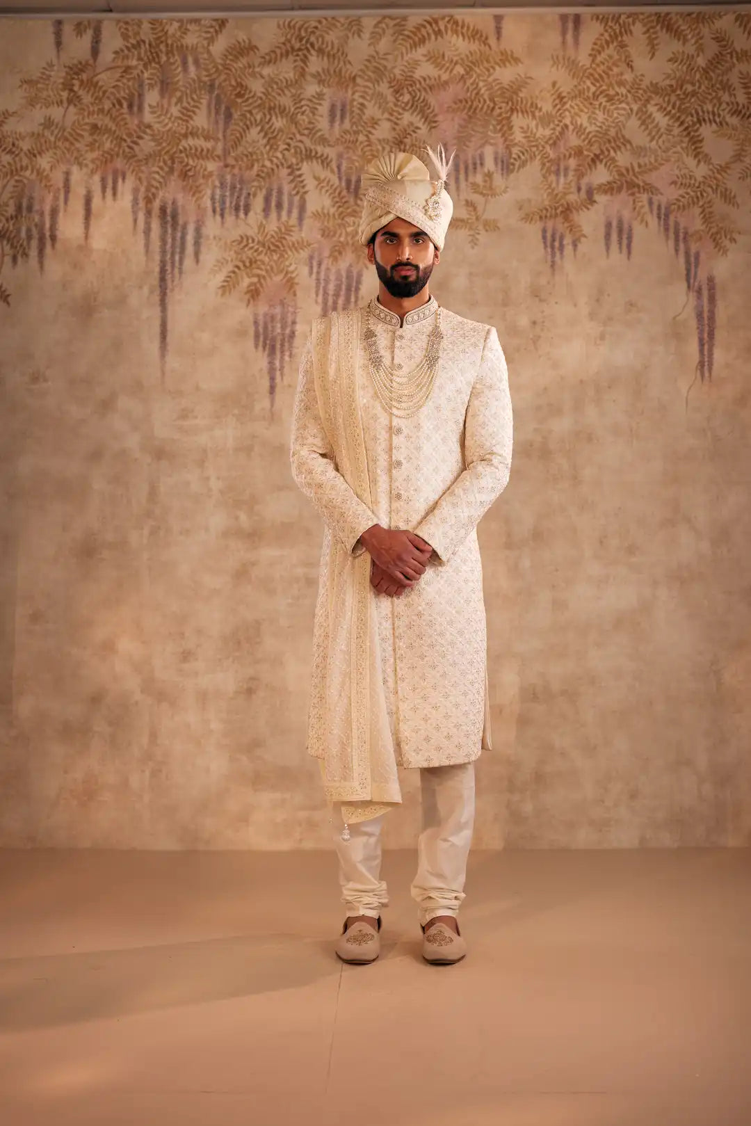 Ivory silk Sherwani with geometric and Floral embroidery