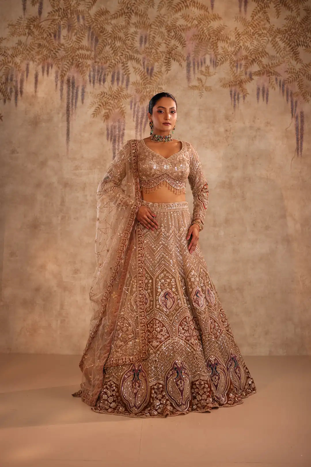 Gold embroidered lehenga with peacock motifs