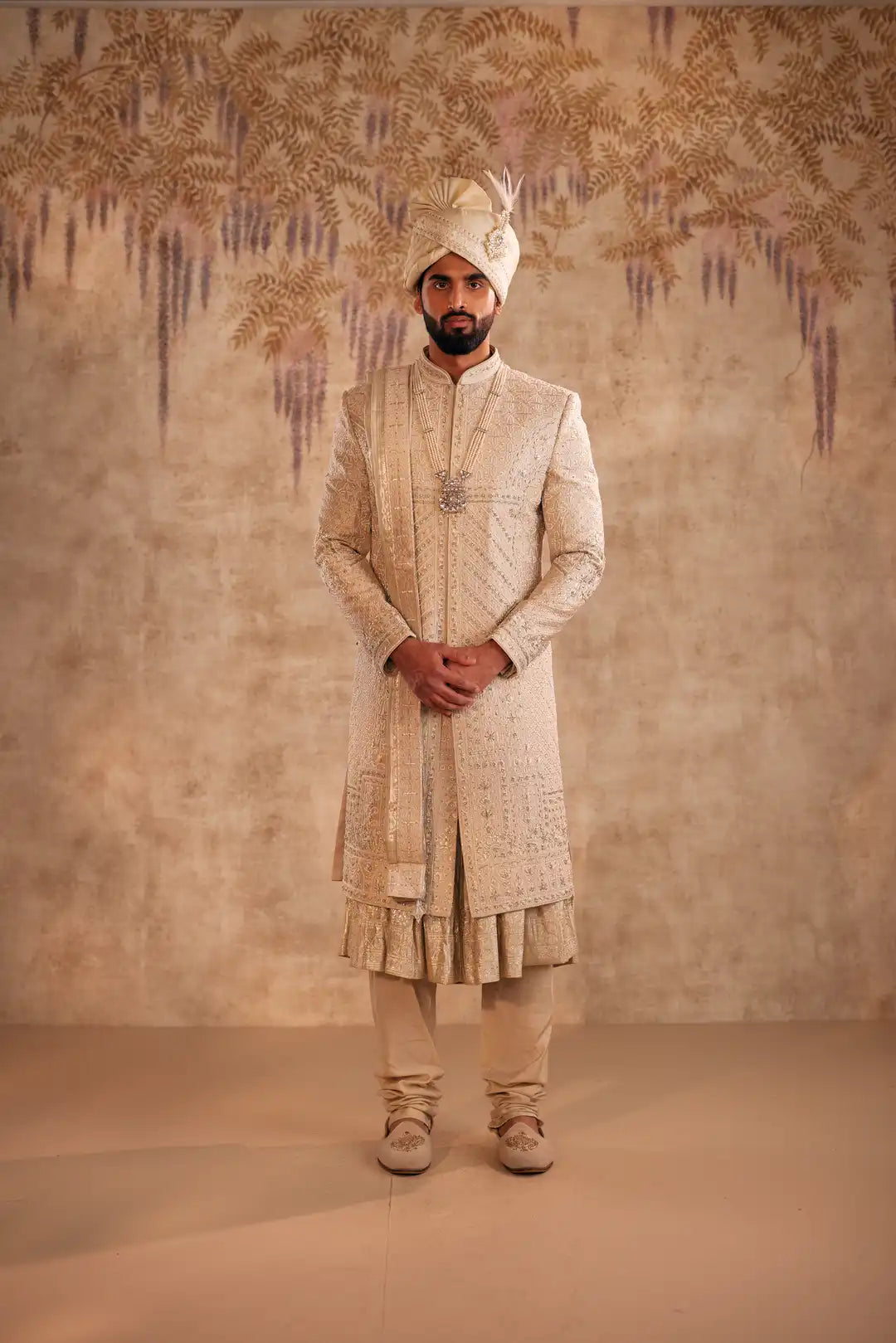 Gold Sherwani set with zardozi and Butti work