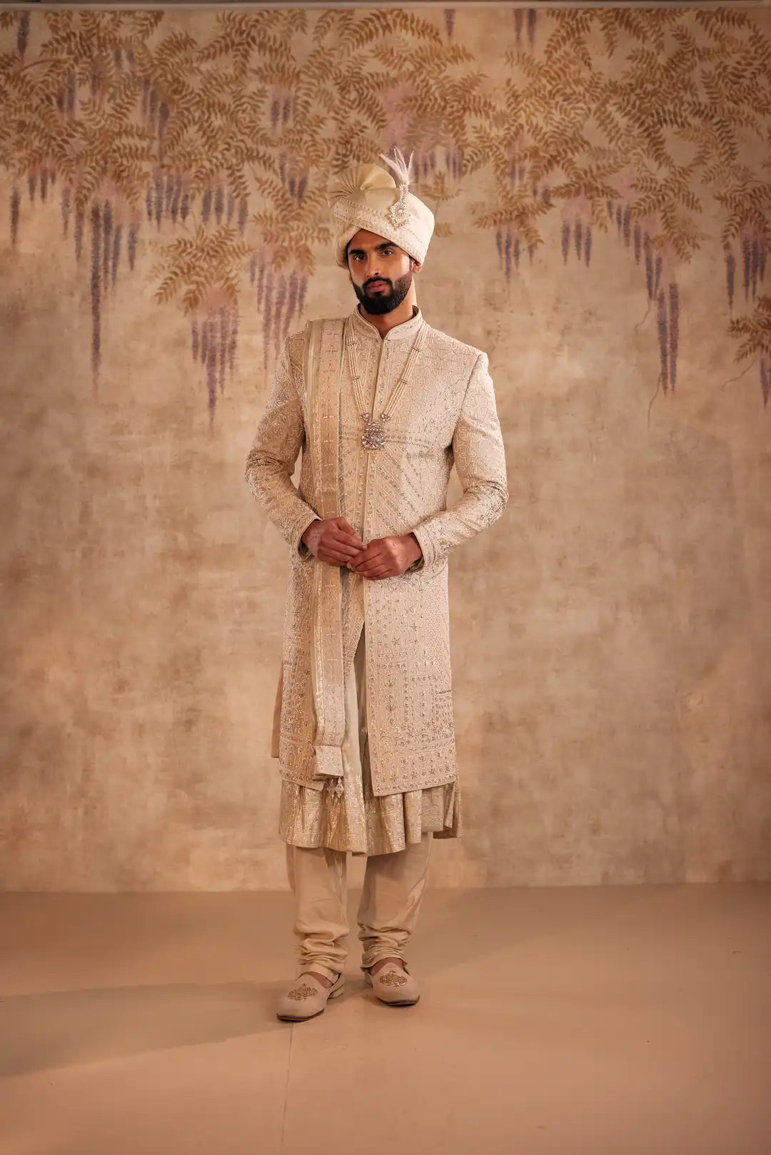 Gold Sherwani set with zardozi and Butti work