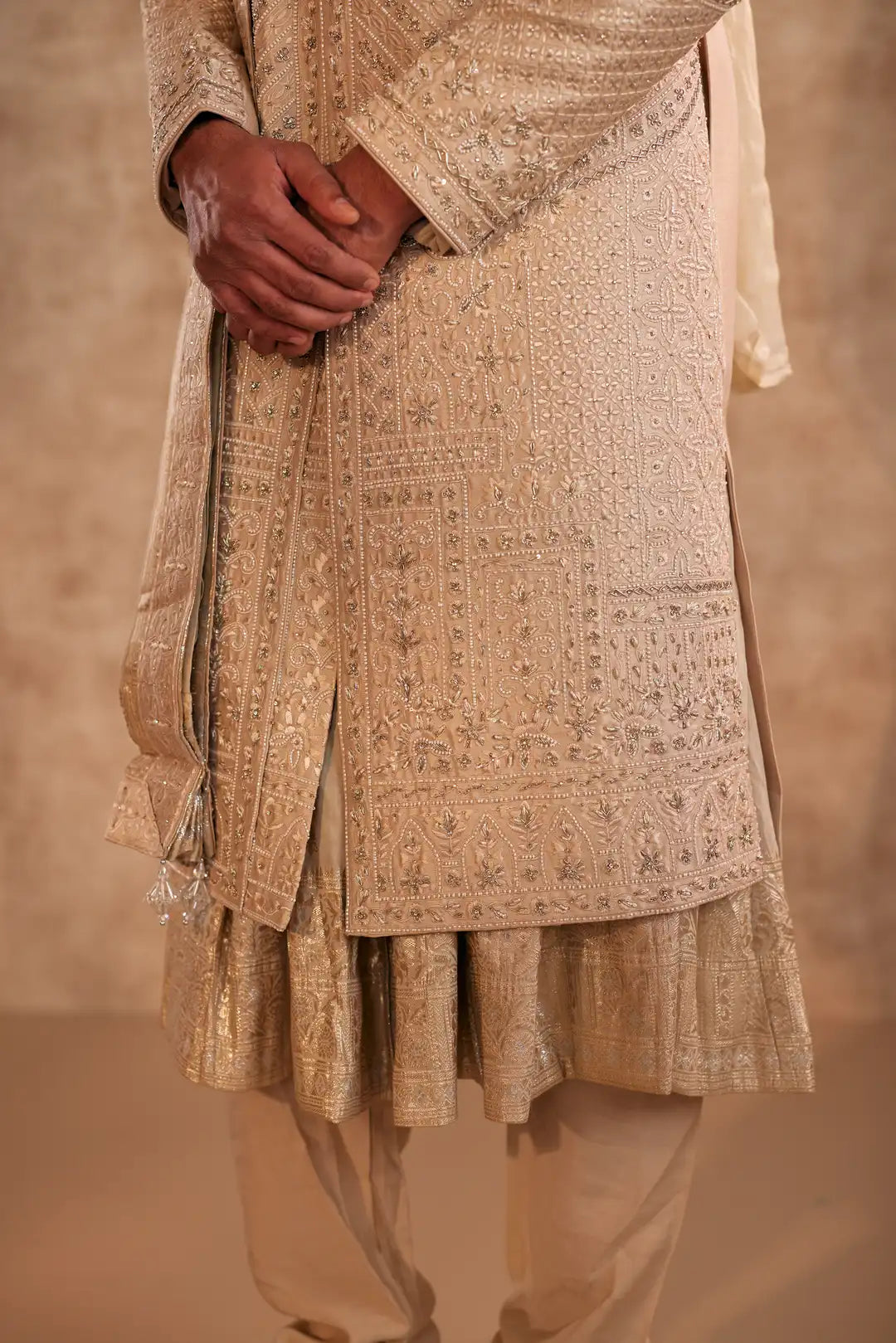 Gold Sherwani set with zardozi and Butti work