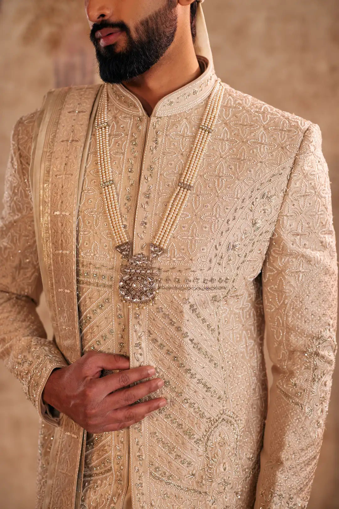 Gold Sherwani set with zardozi and Butti work