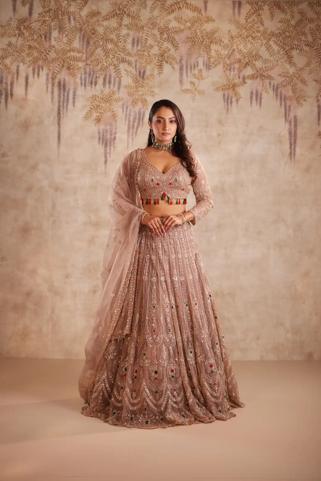 Mauve net lehenga with multi color beadwork