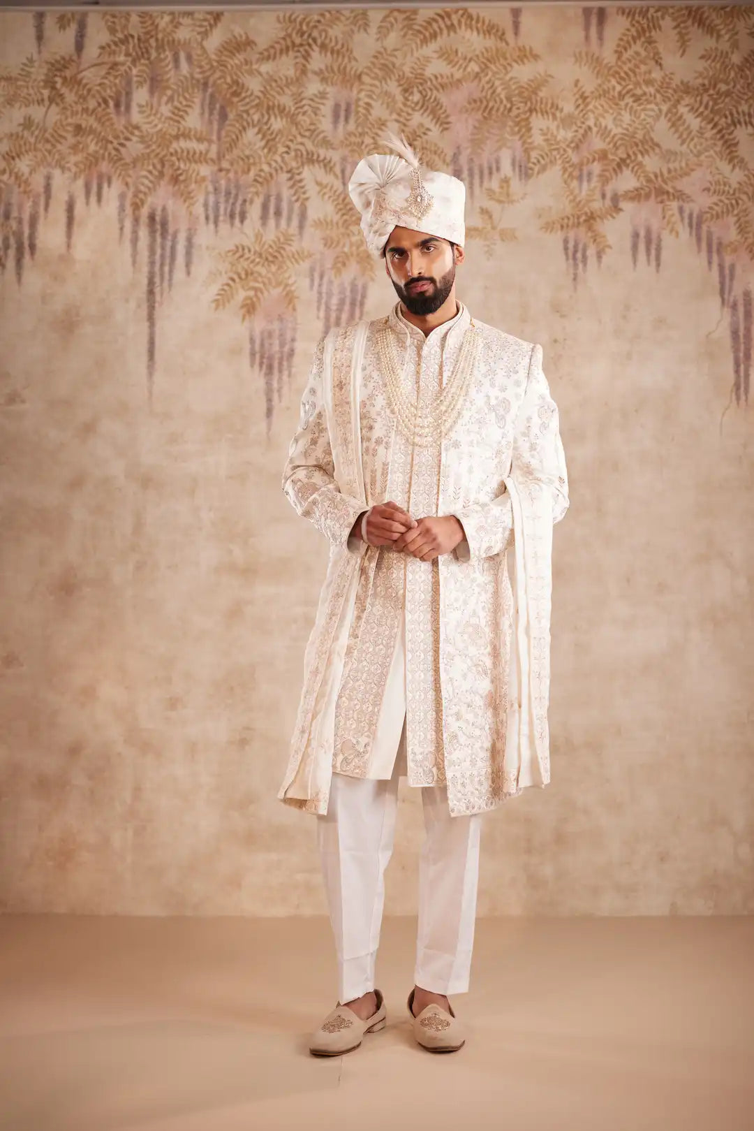 Off white silk Sherwani with pastel floral embroidery
