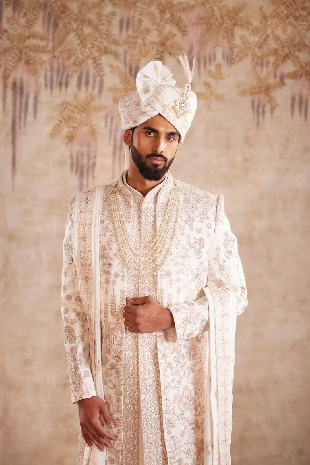 Off white silk Sherwani with pastel floral embroidery