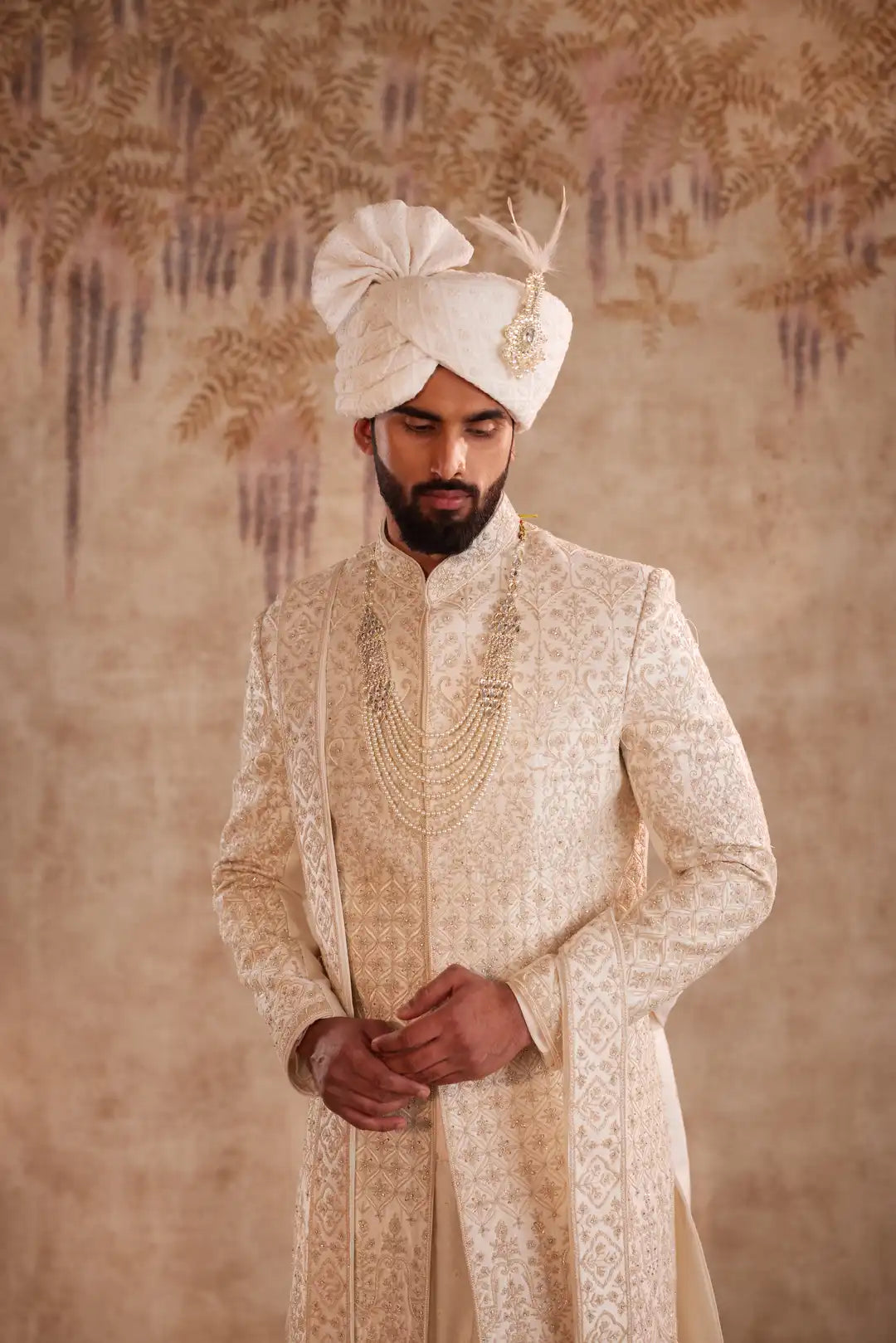 Ivory Sherwani suit with beads and zari work