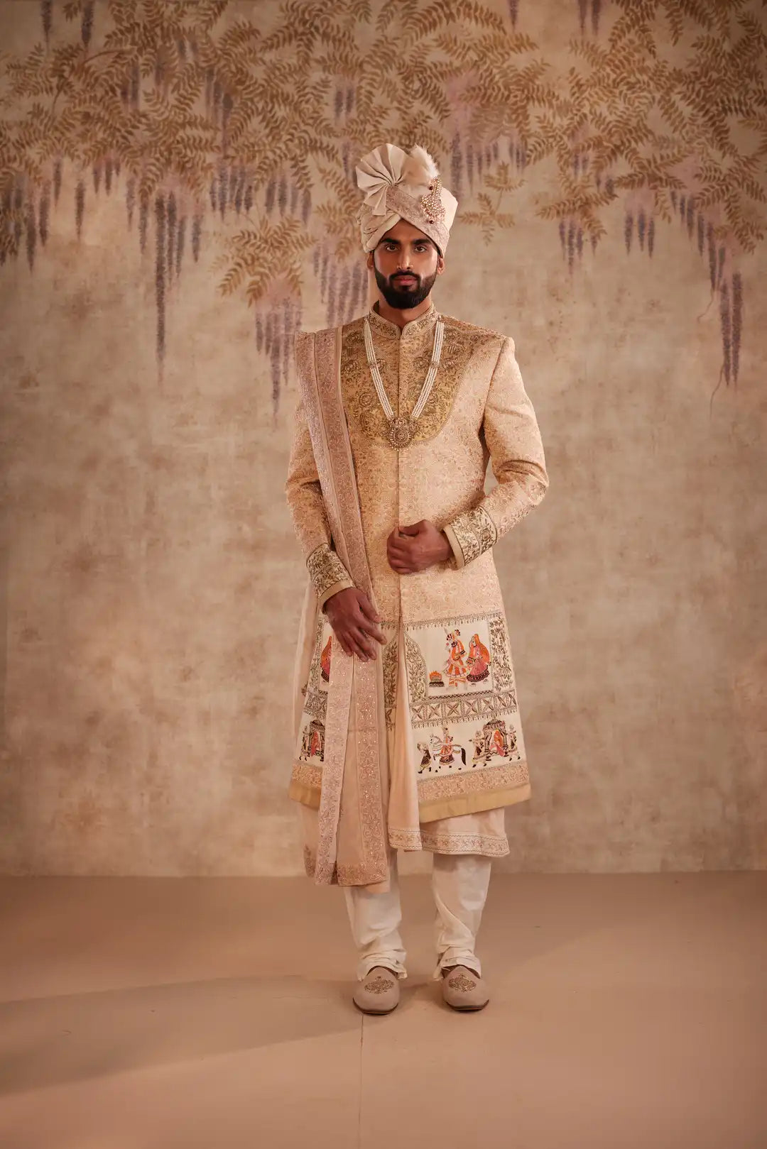 Gold silk Sherwani for groom with intricate hand embroidery