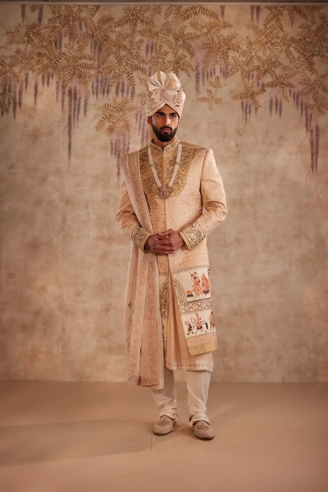 Gold silk Sherwani for groom with intricate hand embroidery