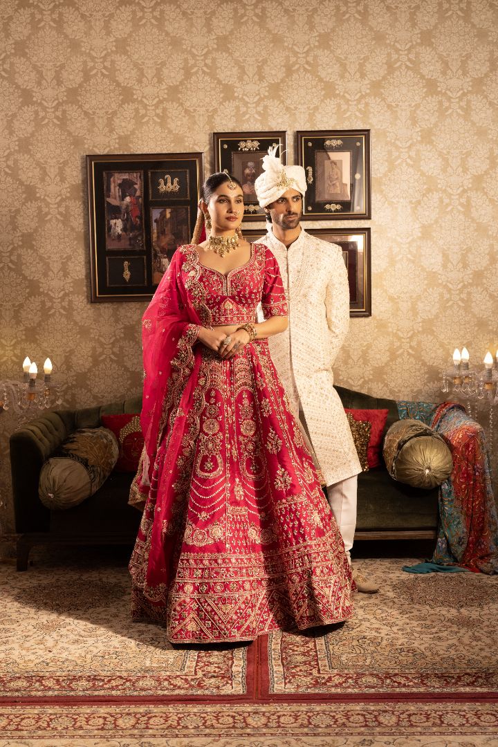 Red silk bridal lehenga with beads and cutdana embellishments