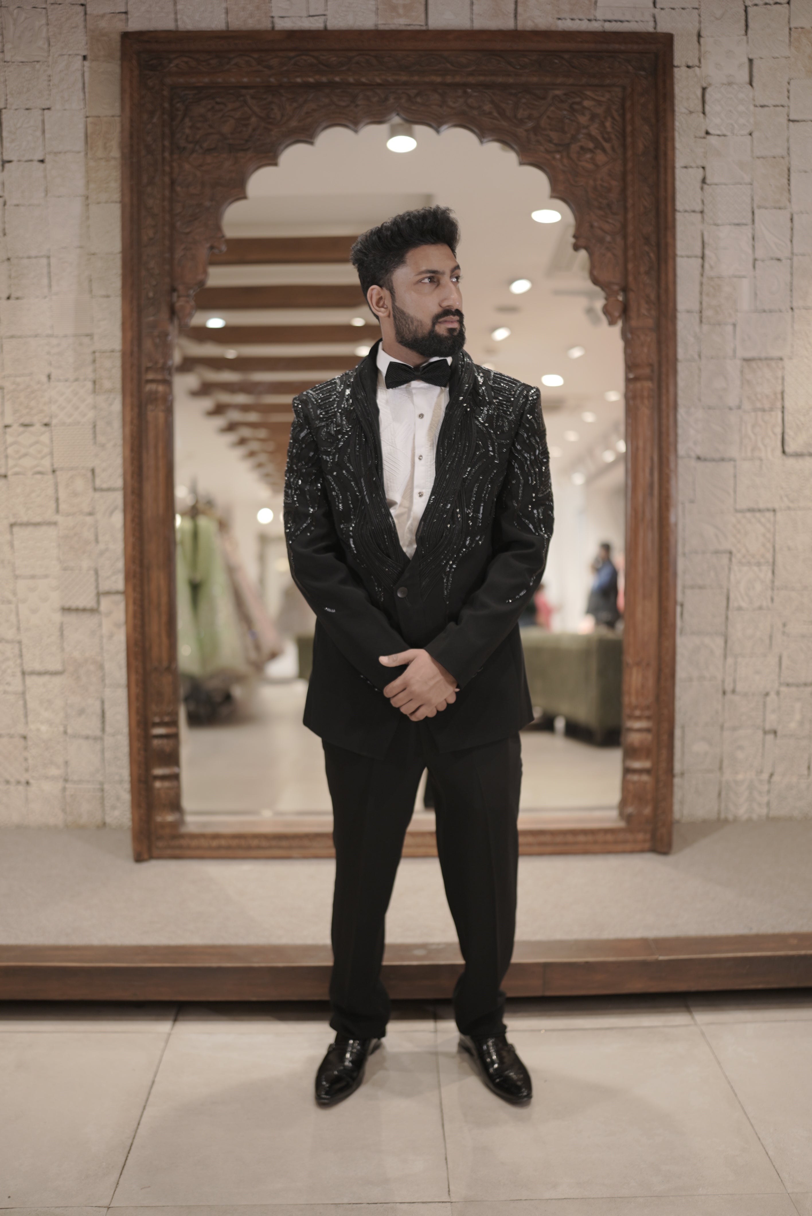 Black tuxedo with embroidered collar