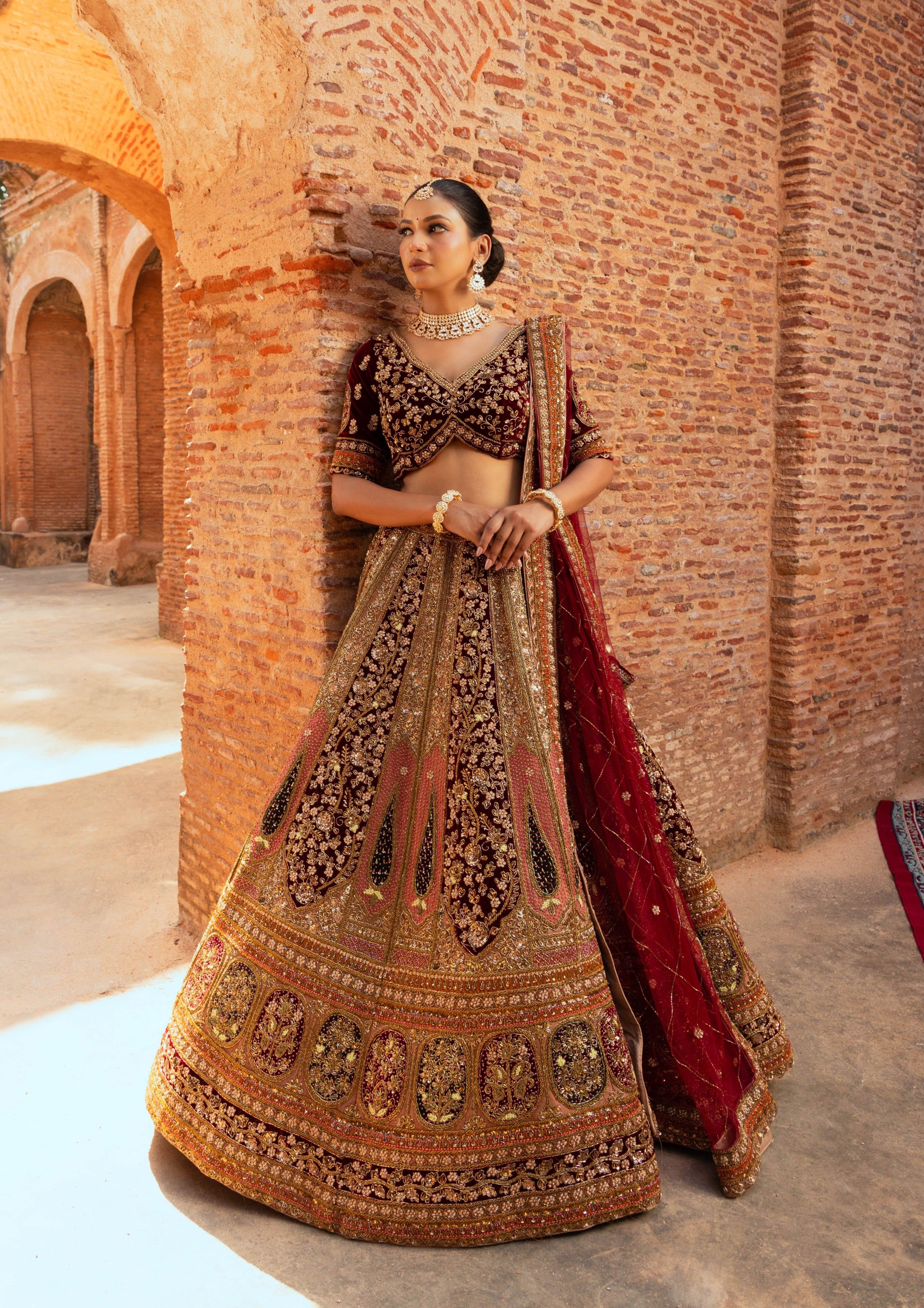 Velvet Fabric Maroon Color Riveting Bridal Lehenga Choli