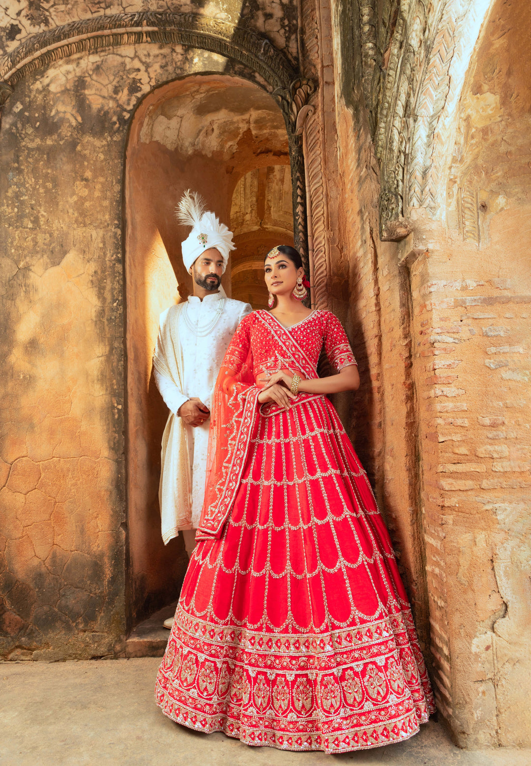 Elegant Red Silk Lehenga with Pearl and Zardozi Embellishments