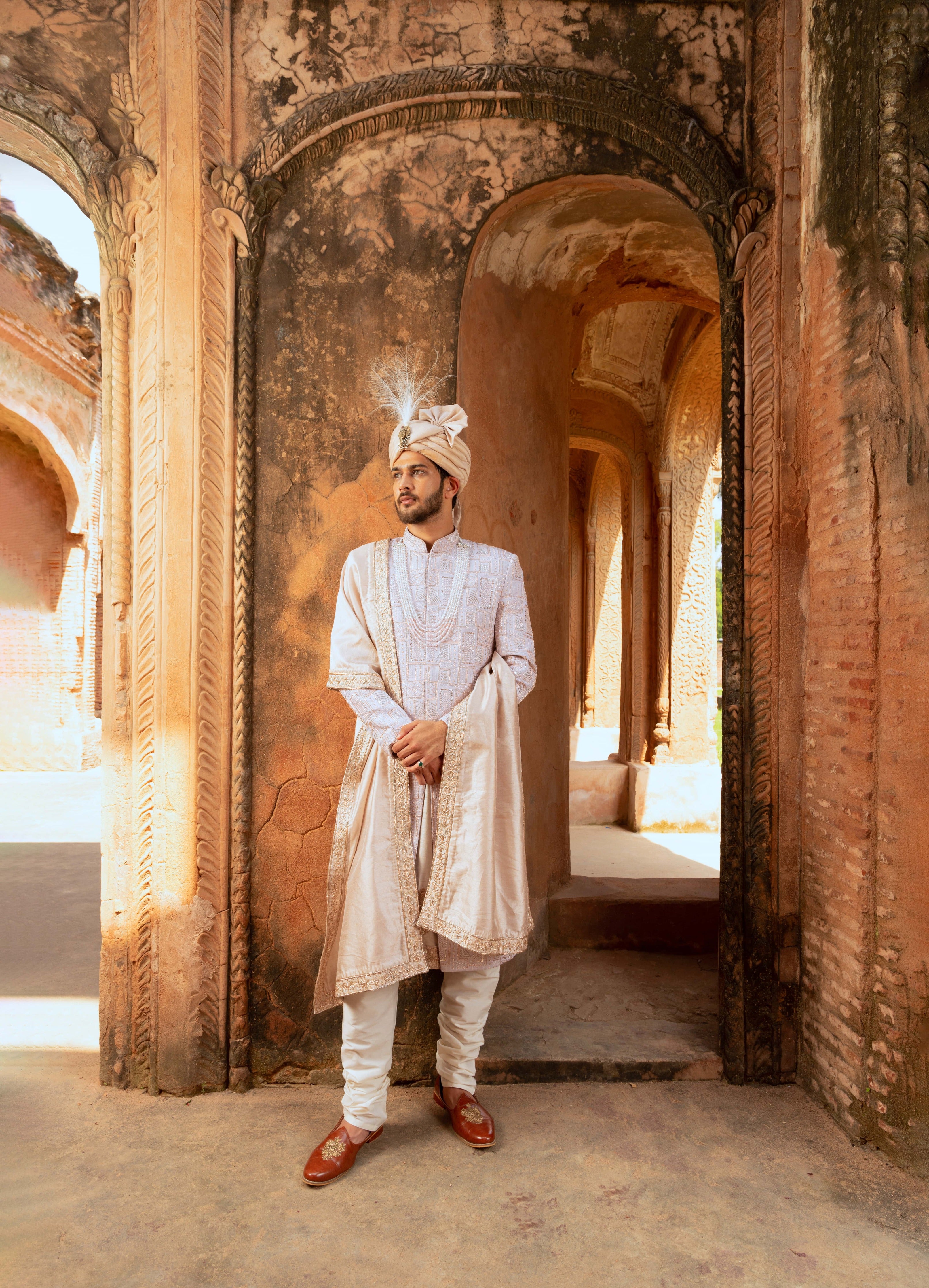 Georgette Groom's Sherwani with Geometric Motifs, Sequins, and Cutdana Detailing (Sherwani set)