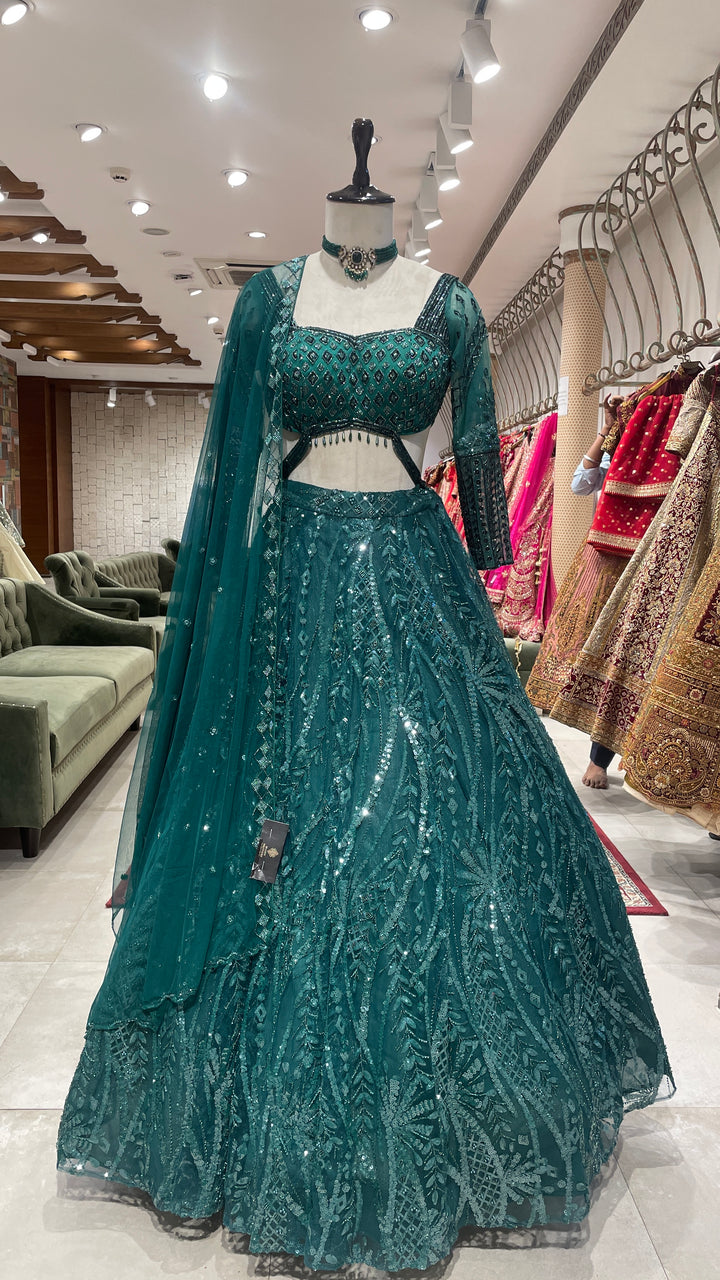 Green Net lehenga with sequins embellishments