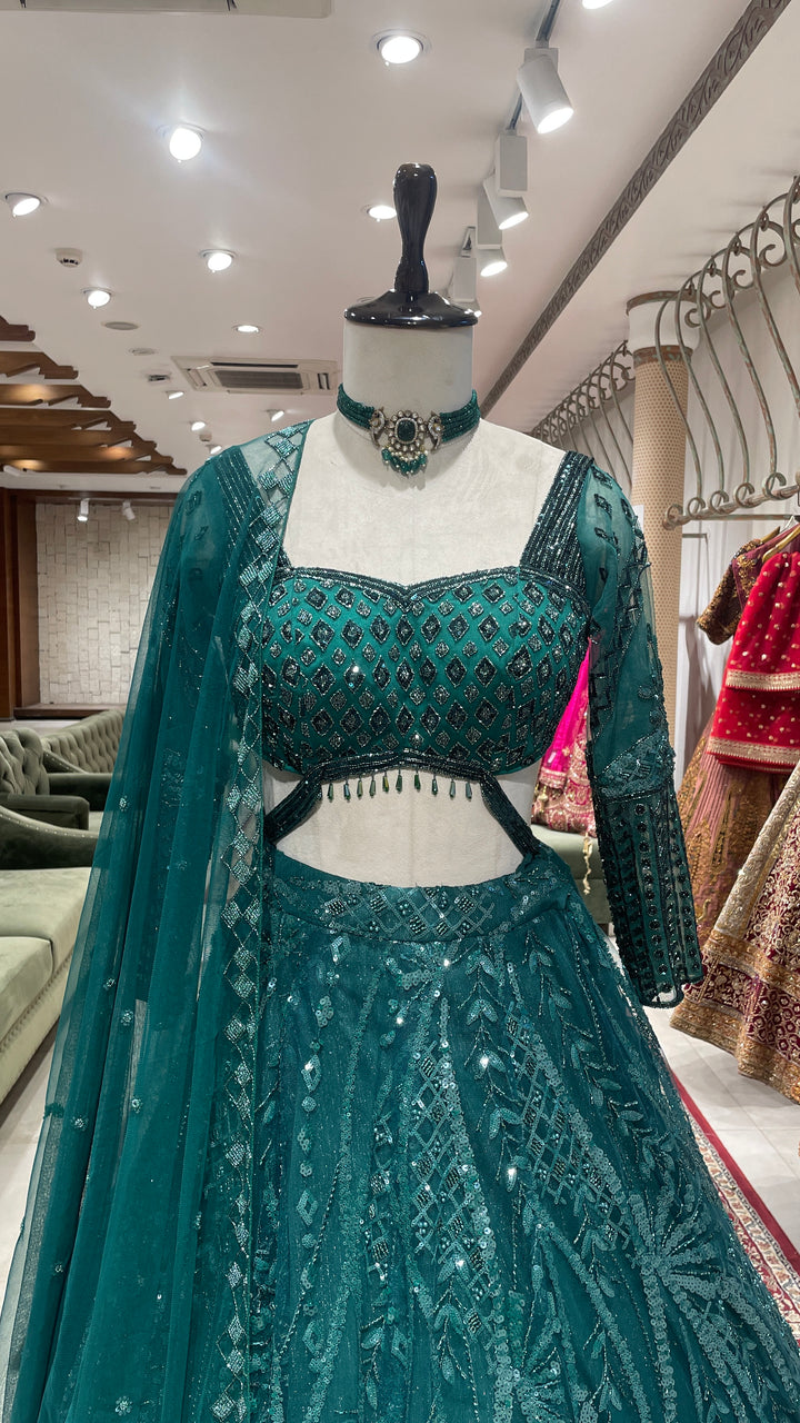 Green Net lehenga with sequins embellishments