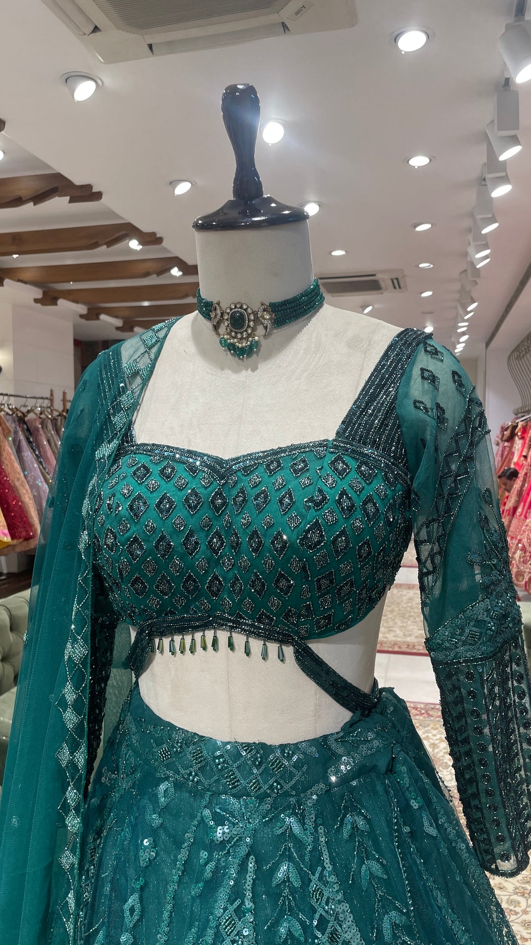 Green Net lehenga with sequins embellishments