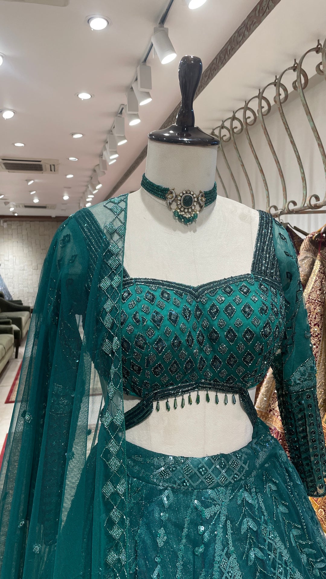 Green Net lehenga with sequins embellishments