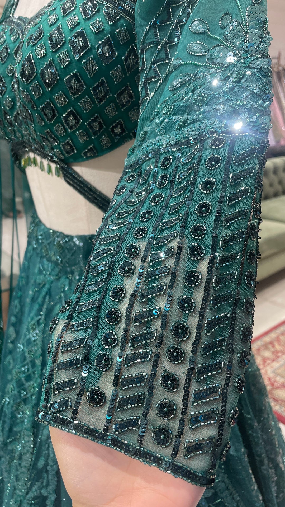 Green Net lehenga with sequins embellishments