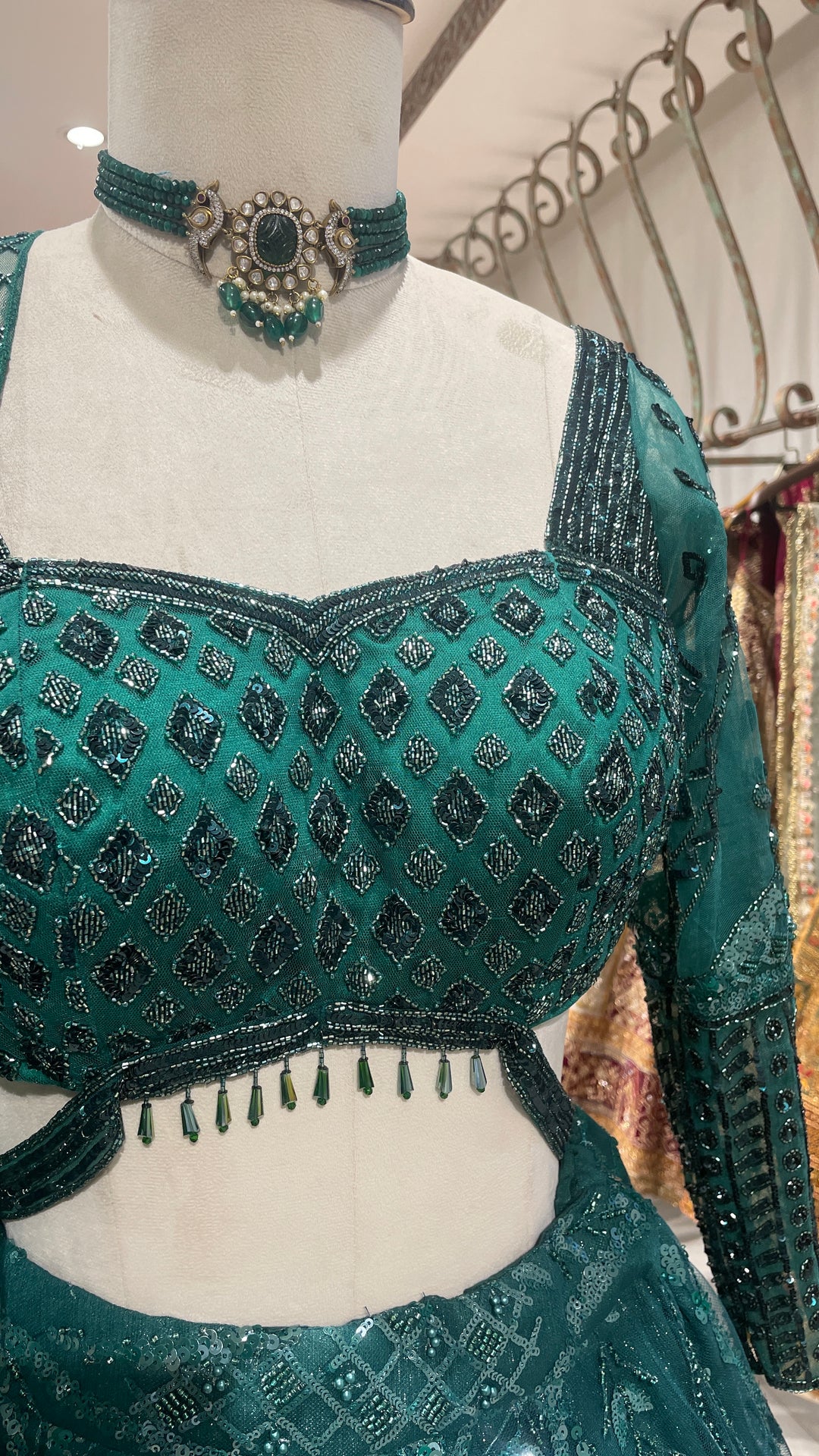 Green Net lehenga with sequins embellishments