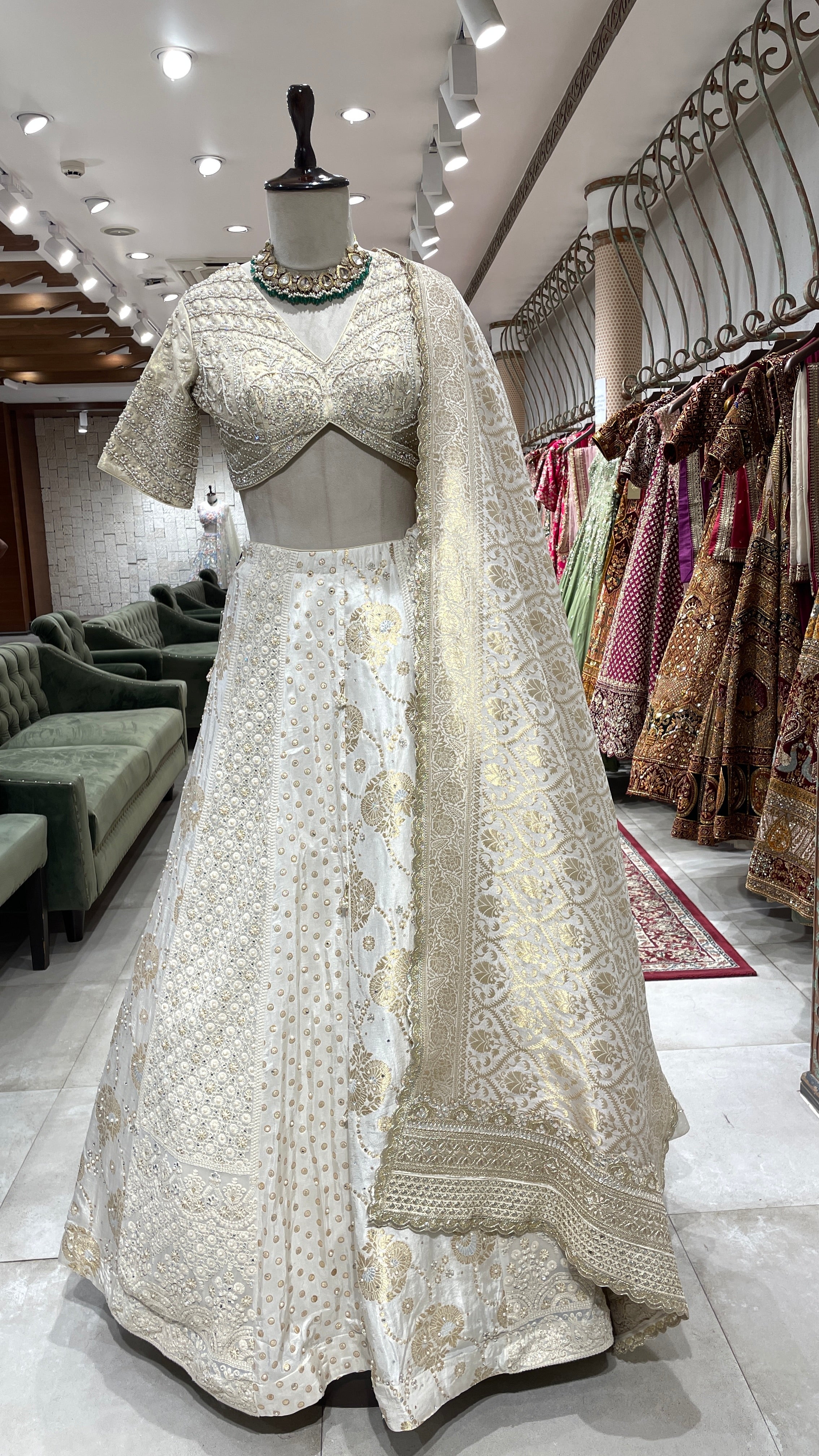 Ivory silk lehenga with embellished blouse