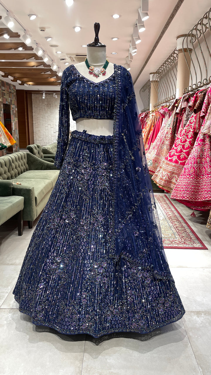 Royal blue lehenga with heavy sequins embellishments