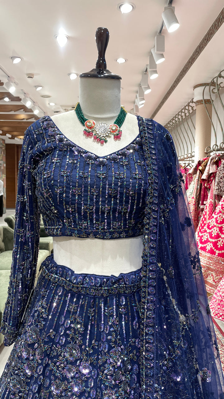 Royal blue lehenga with heavy sequins embellishments