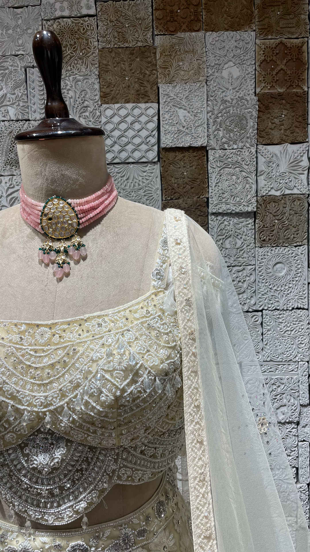 Ivory handwork embellished lehenga with cutdana and heavy latkans