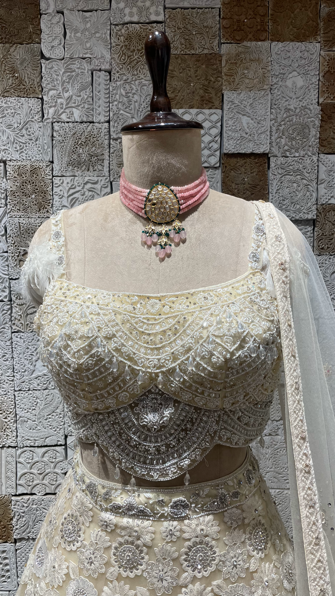 Ivory handwork embellished lehenga with cutdana and heavy latkans