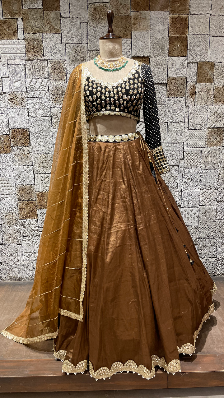 Rust Tissue Lehenga with Heavy embroidered Blouse