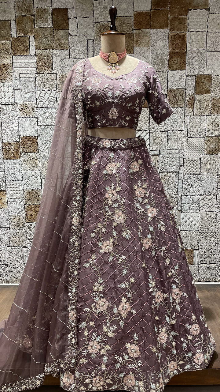 Purple Silk Lehenga with Sequins and cutdana embellishments and floral motifs