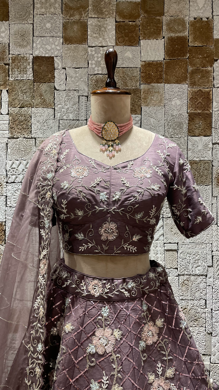 Purple Silk Lehenga with Sequins and cutdana embellishments and floral motifs