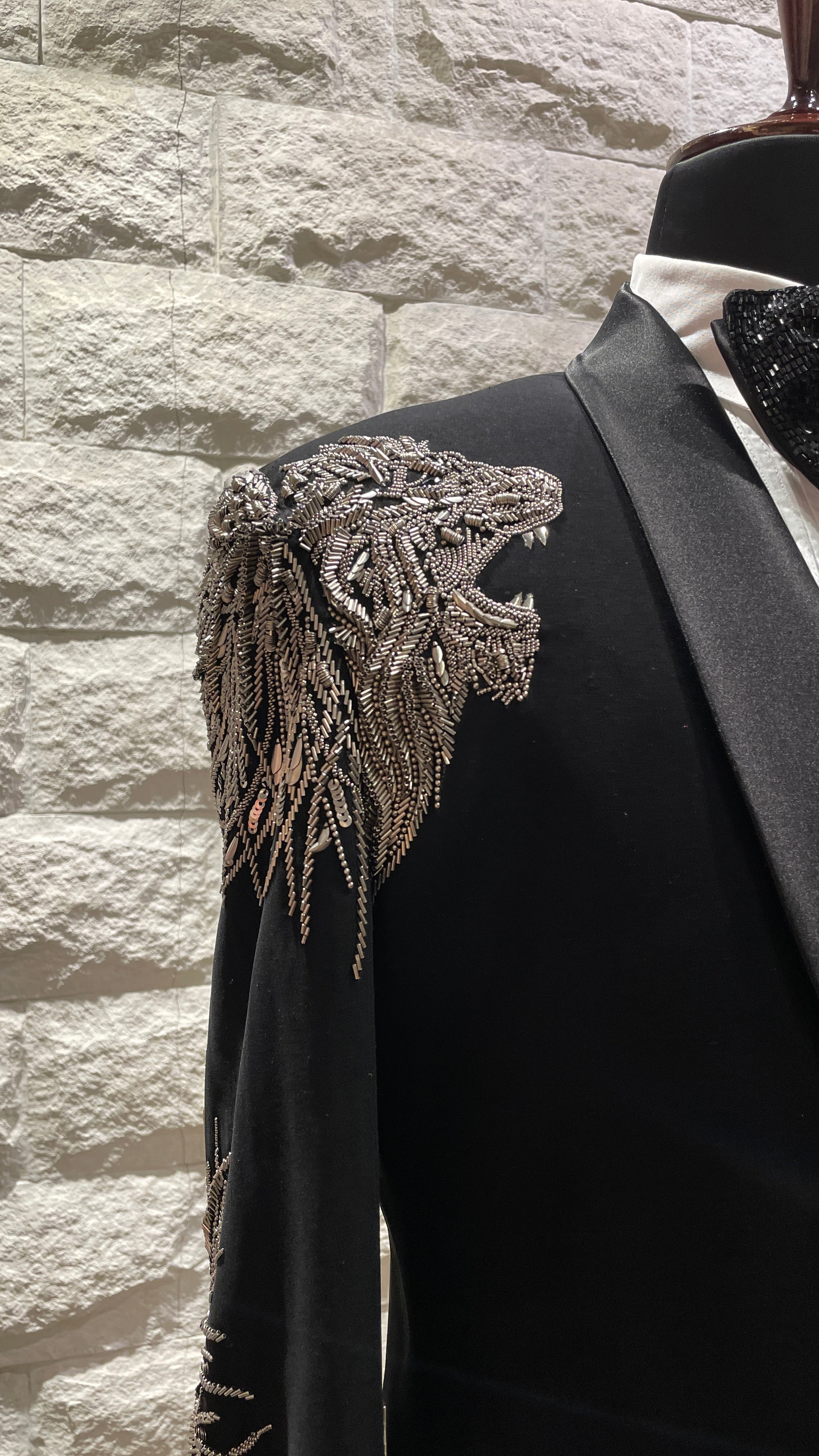 Black tuxedo with statement silver motif