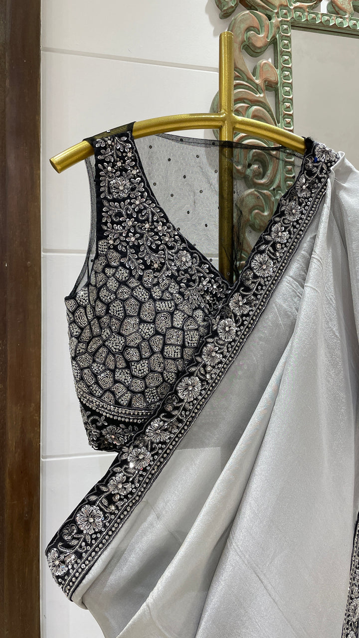 Silver tissue saree with black border