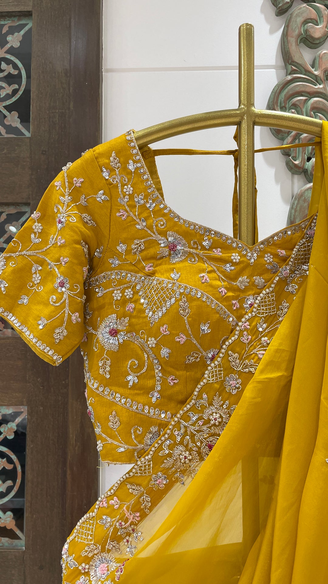 Mustard organza saree with floral motifs