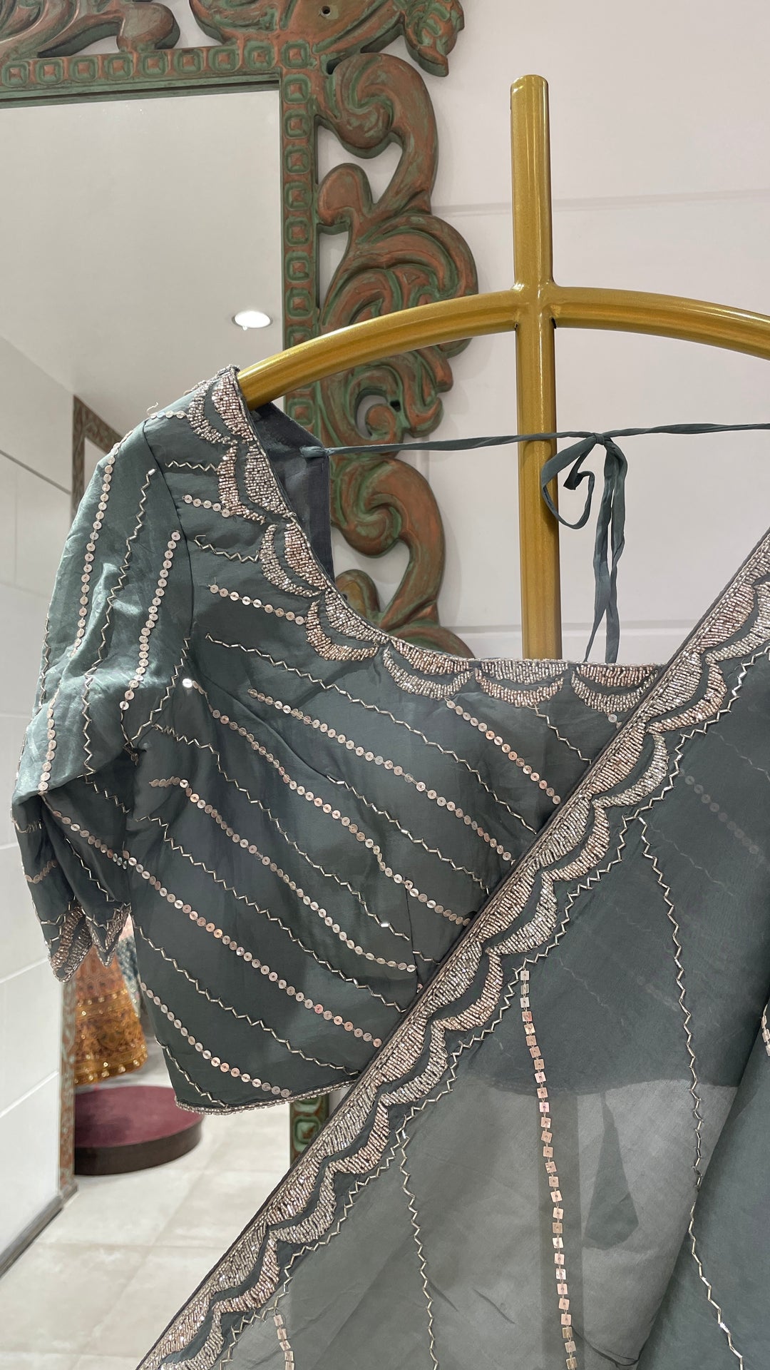 Grey organza saree with cutdana embellishment