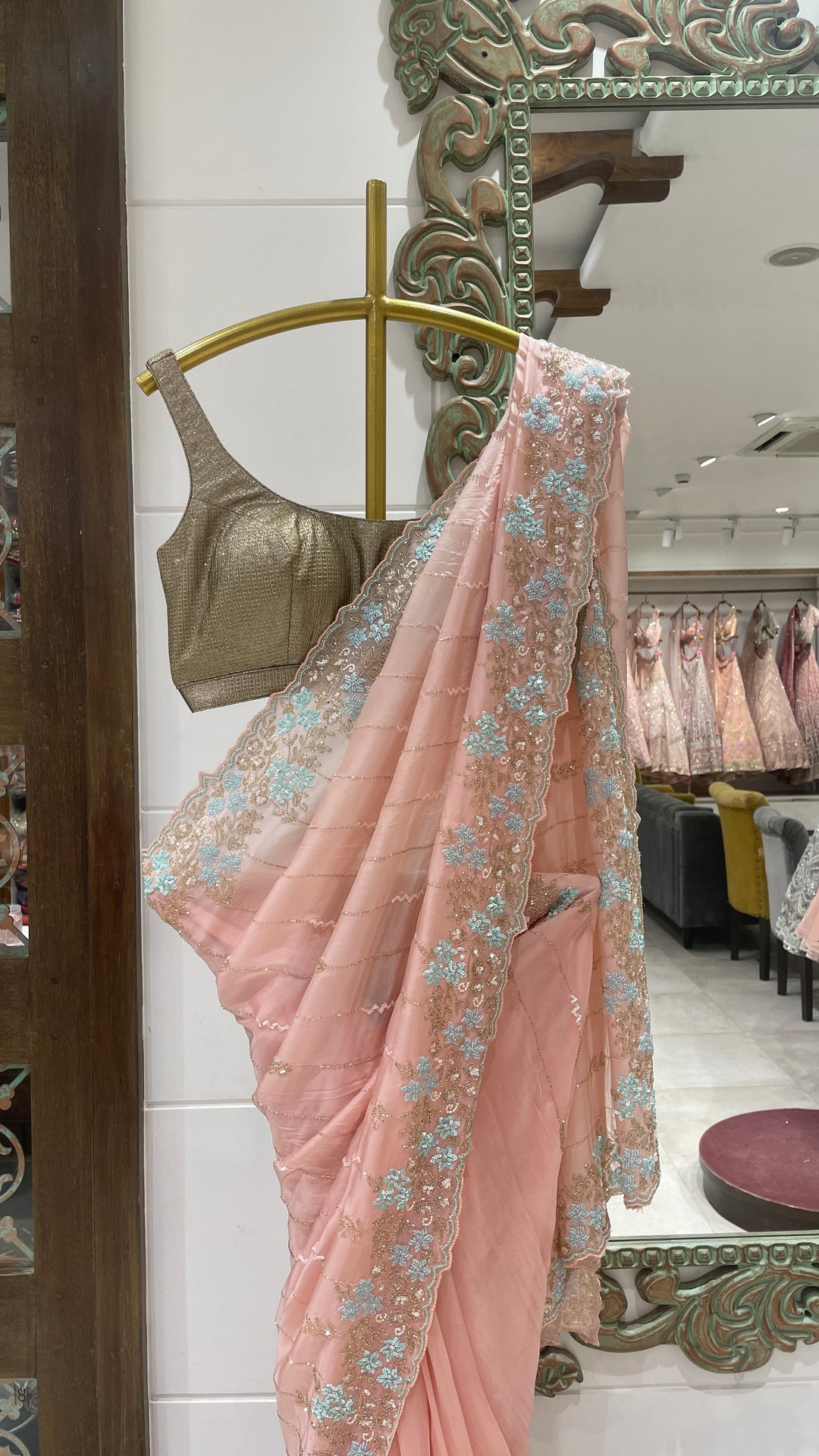 Pink organza saree with embellishments