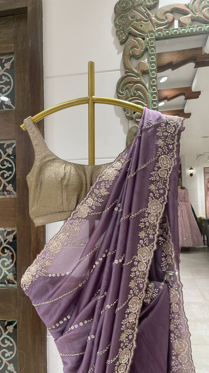 Purple organza saree with floral motifs