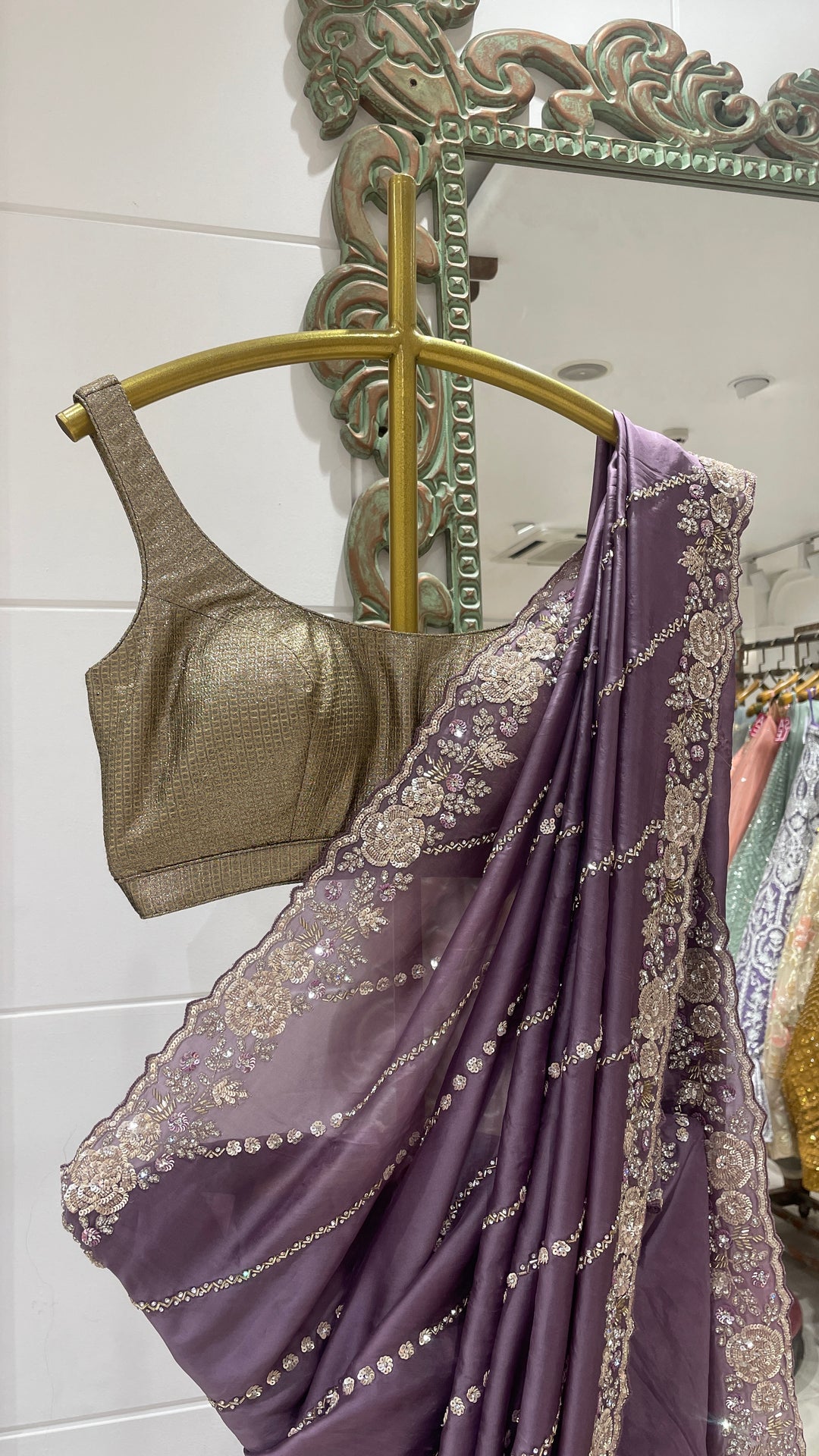 Purple organza saree with floral motifs