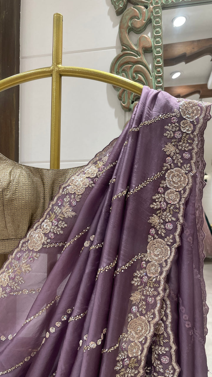 Purple organza saree with floral motifs