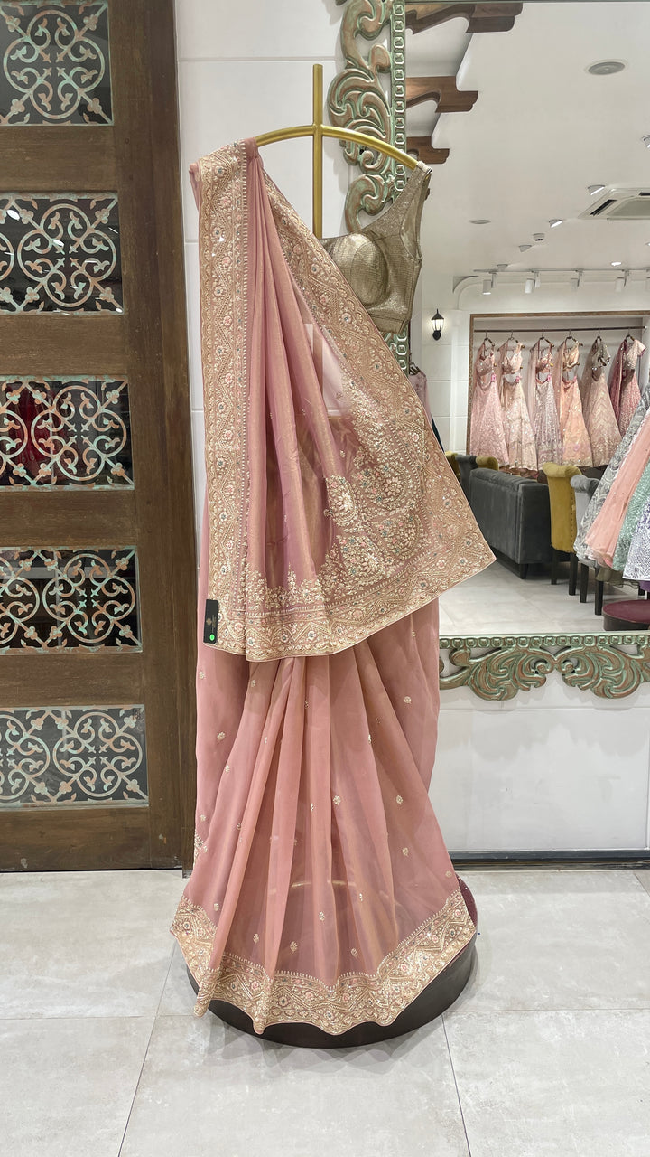 Pink tissue saree with zariwork