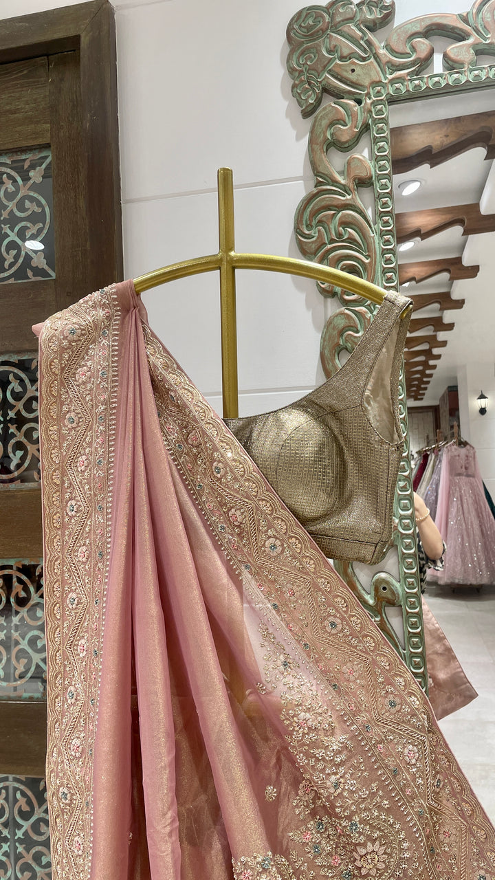 Pink tissue saree with zariwork