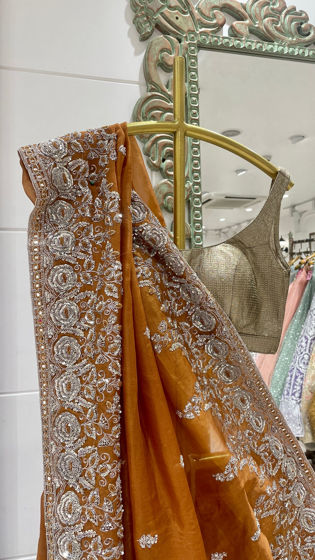 Rust Organza saree with zariwork