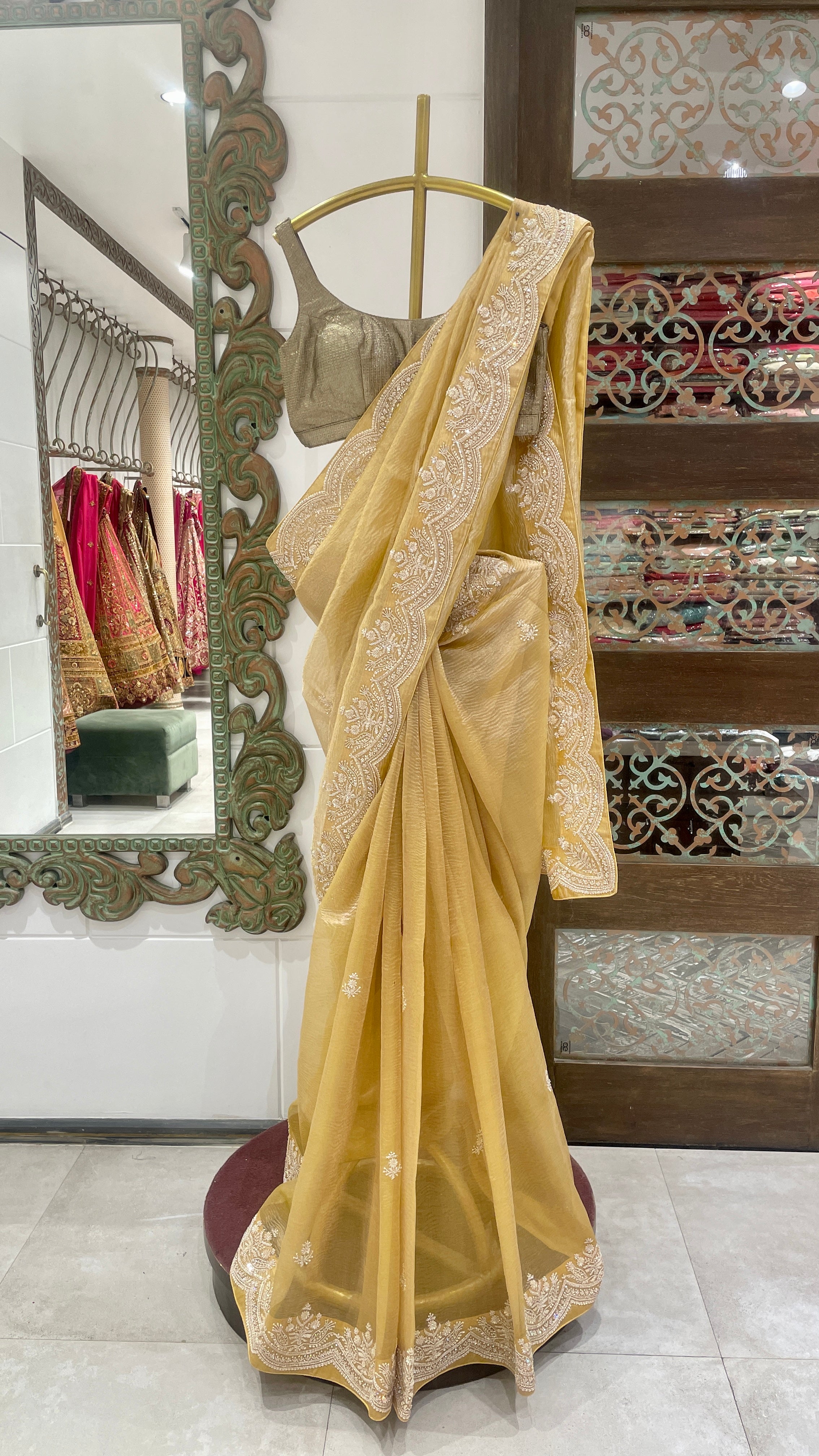 Gold tissue saree with embellishments