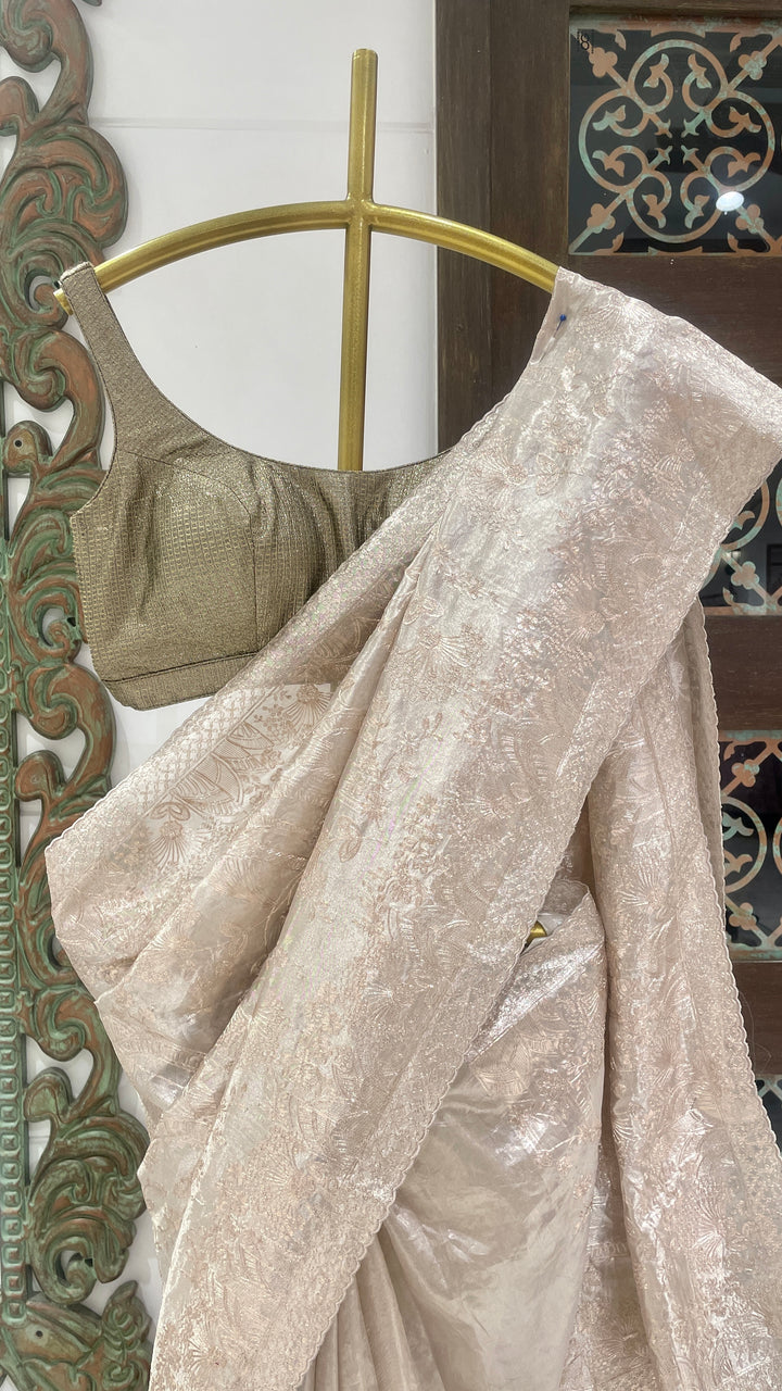Ivory tissue saree with gold zariwork pitta work